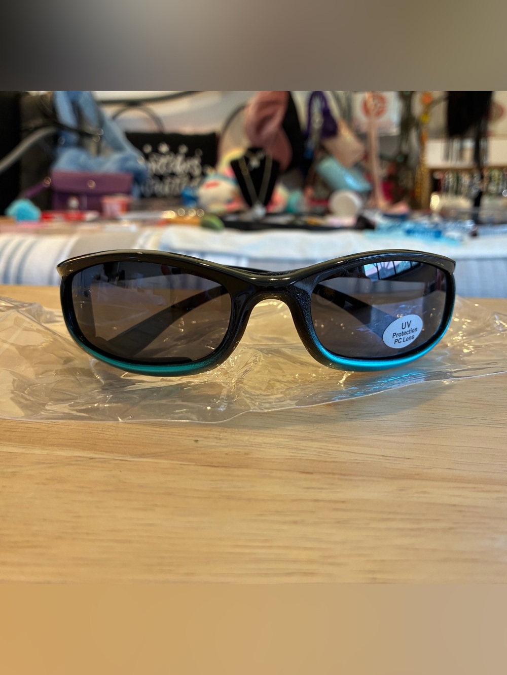 Sleek Black Sunglasses with Metallic blue Temples & Arms